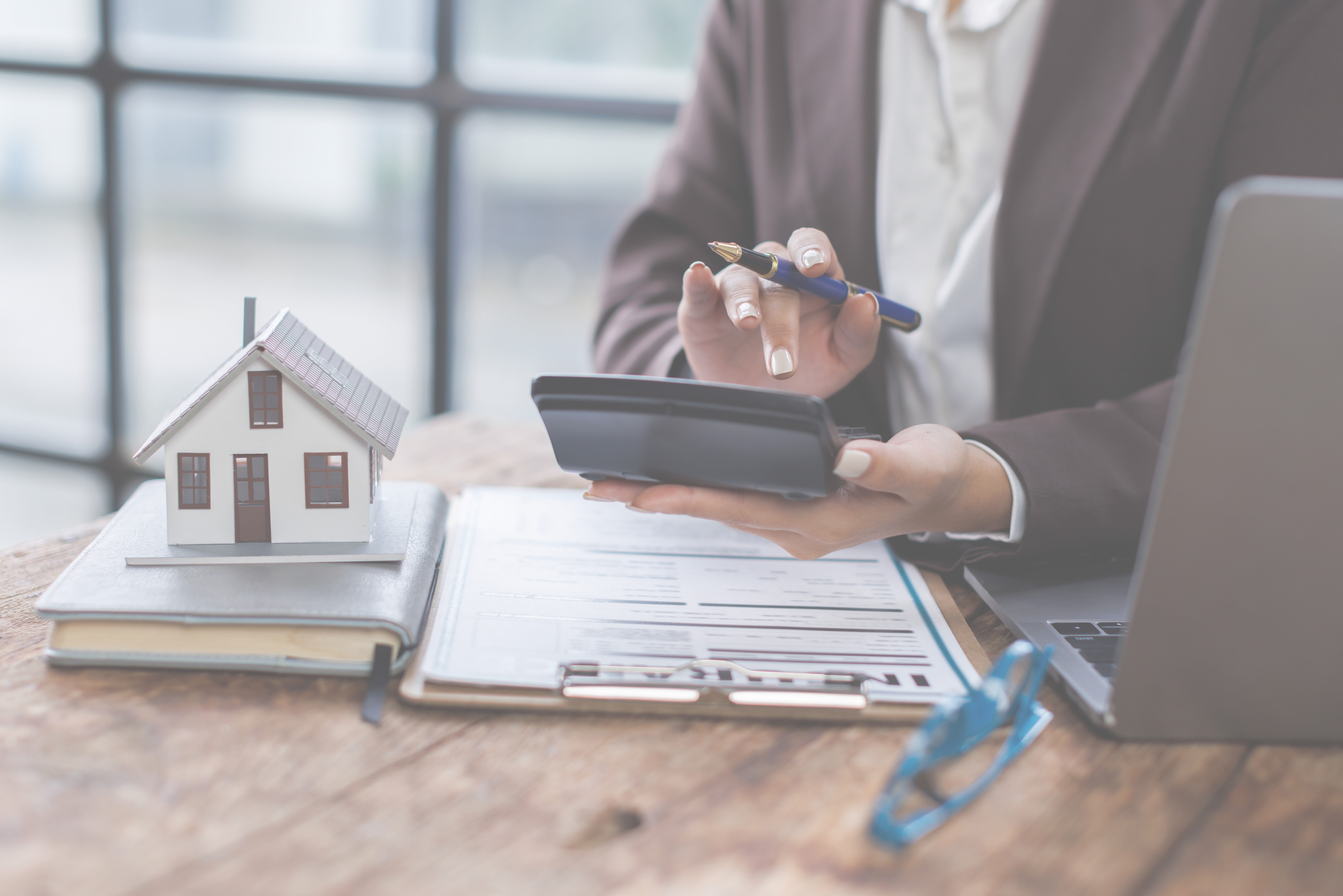 beratung taschenrechner preise hauskauf schreibtisch