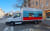 Umzugswagen mit Werbung für einen Umzugsservice, parkend auf der Straße.